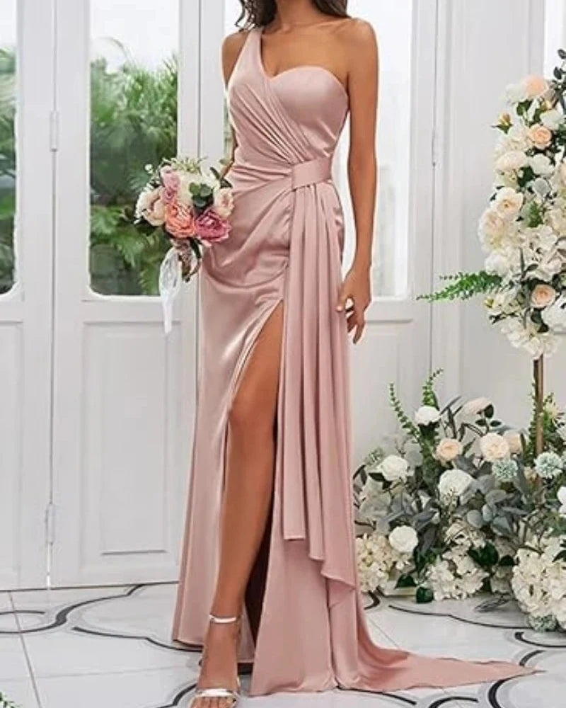 Pink satin mermaid bridesmaid gown with V-neck and draped waist, front slit