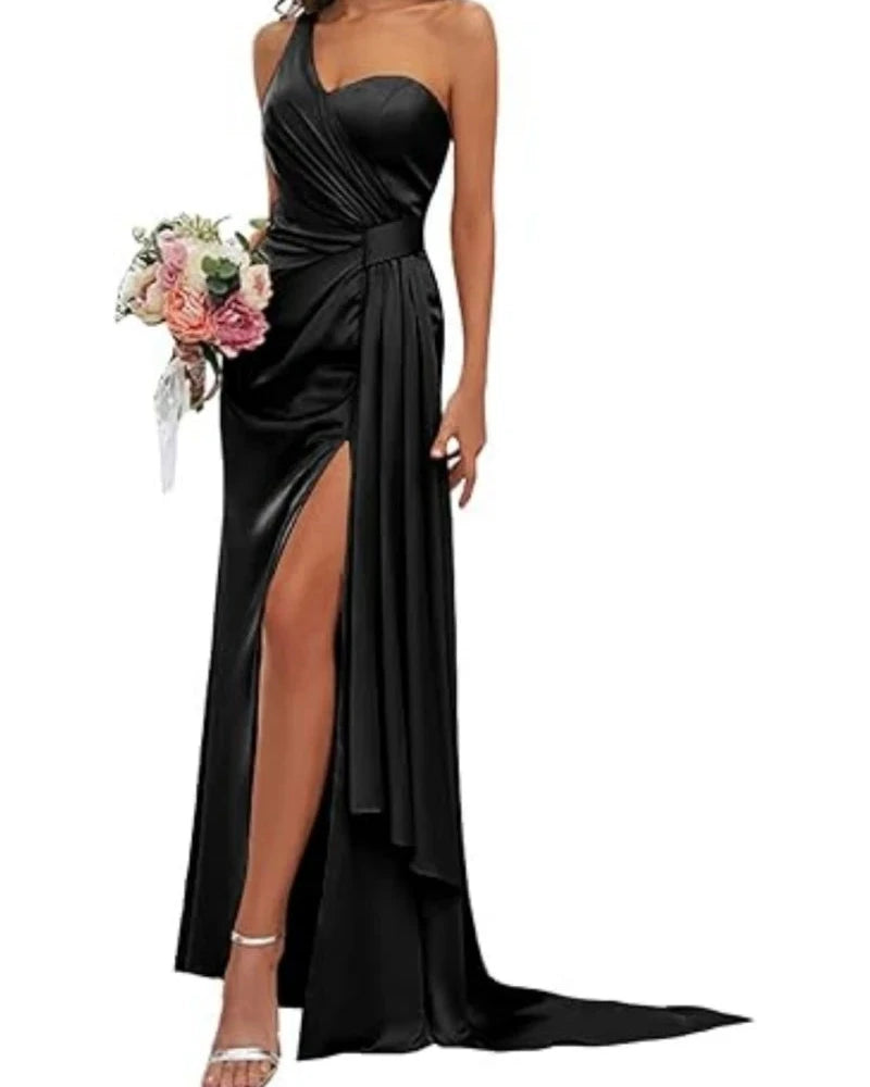Black satin mermaid gown with sweetheart neckline, ruched waist, and front leg slit