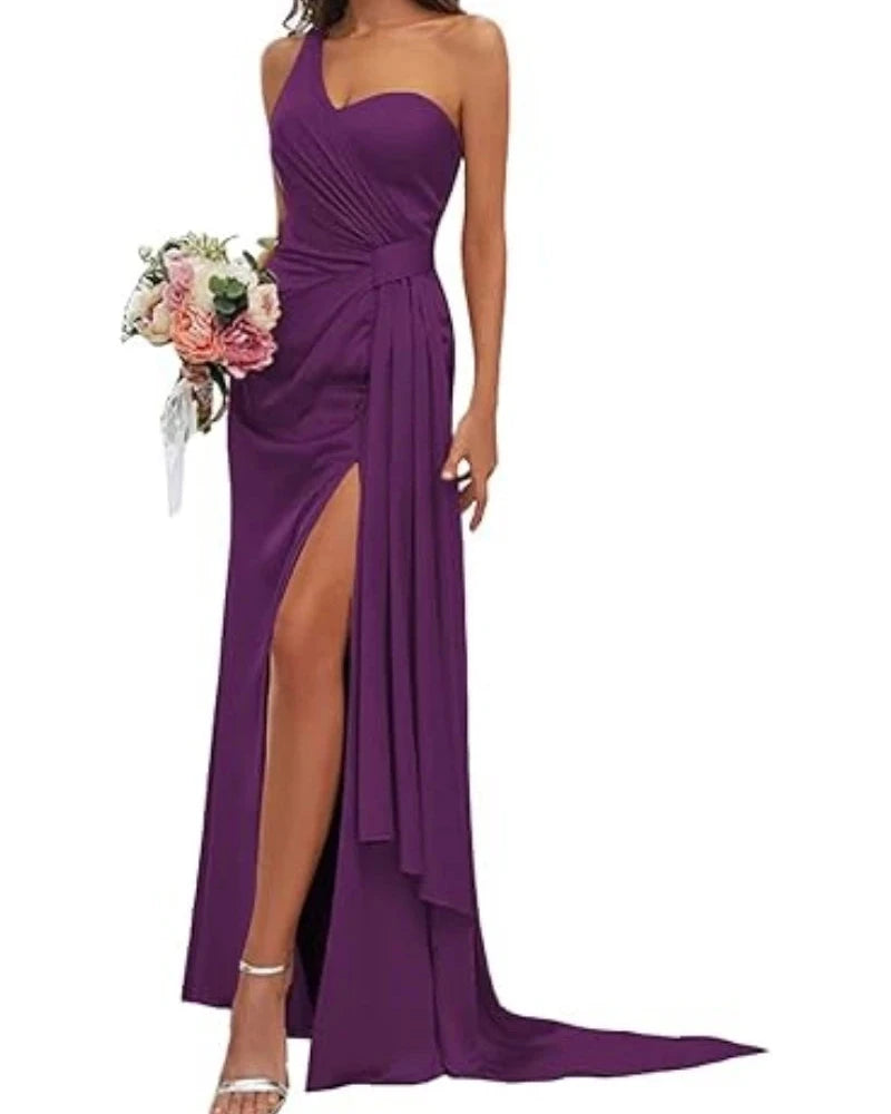 Purple satin mermaid gown with sweetheart neckline, ruched bodice, and front slit