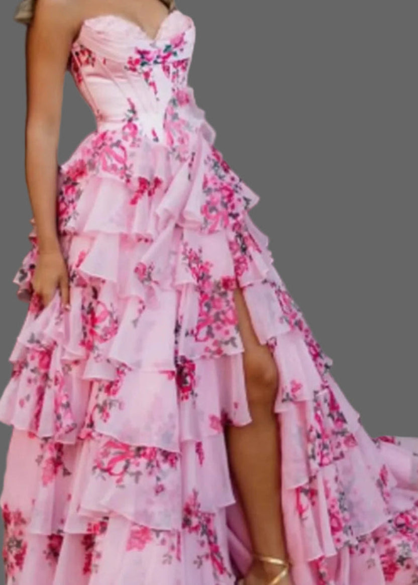 Pink strapless floral ruffle evening dress with tiered skirt and open side