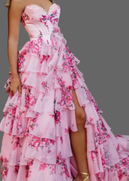 Pink strapless floral ruffle evening dress with tiered skirt and open side