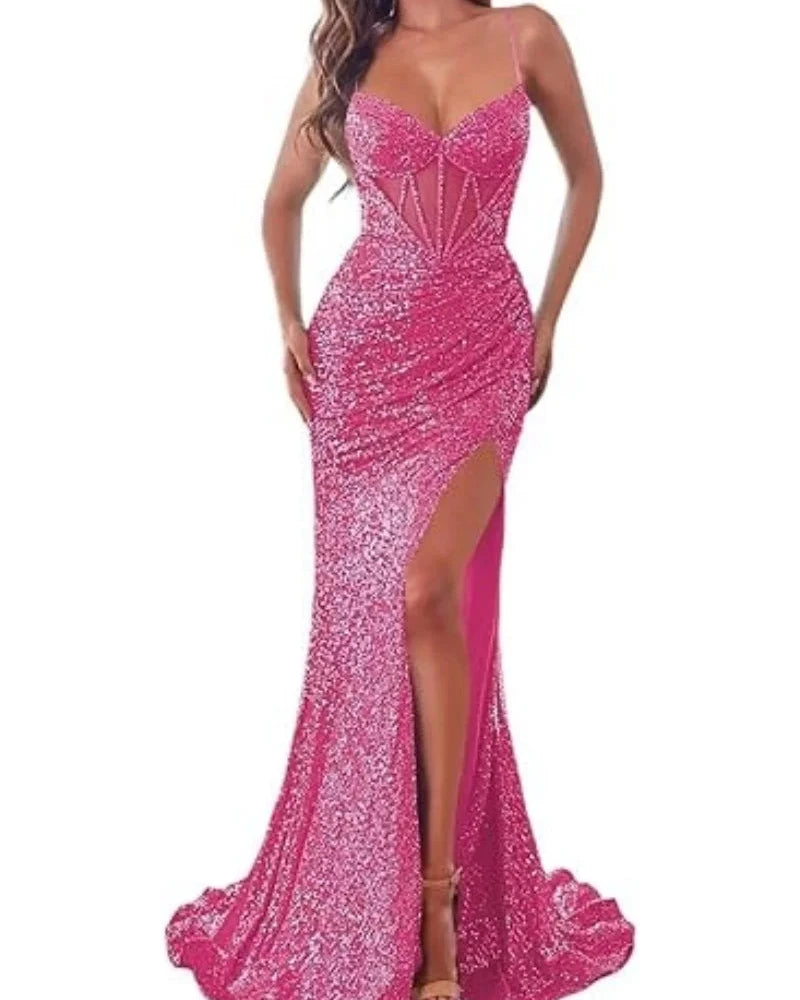 Hot pink sequin mermaid dress with spaghetti straps, sweetheart neckline, and side thigh slit.
