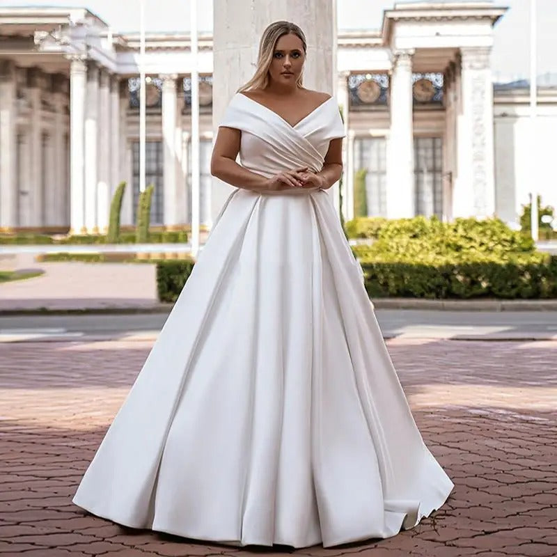 white satin a-line off shoulder wedding dress -formal elegance