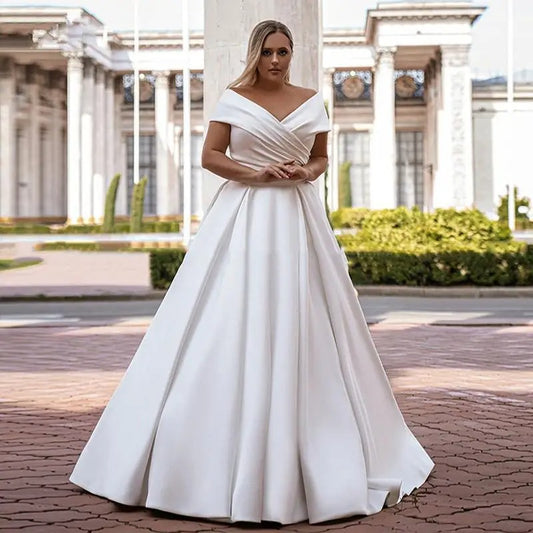 white satin a-line off shoulder wedding dress -formal elegance