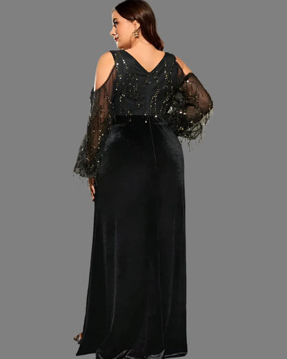Black sequin velvet maxi dress, V-back neckline, sheer beaded sleeves, and flowing A-line skirt