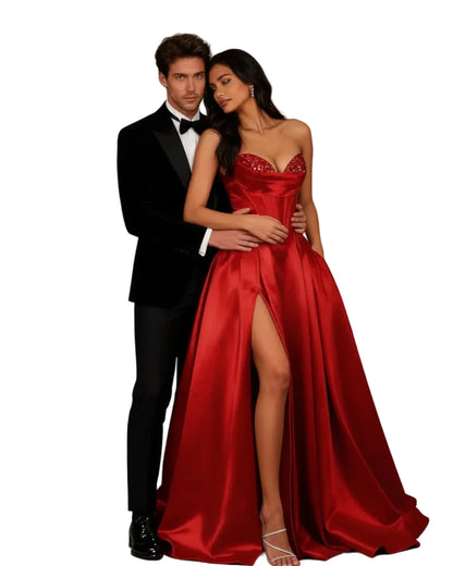 Red strapless A-line satin dress with sequin bust and thigh-high slit