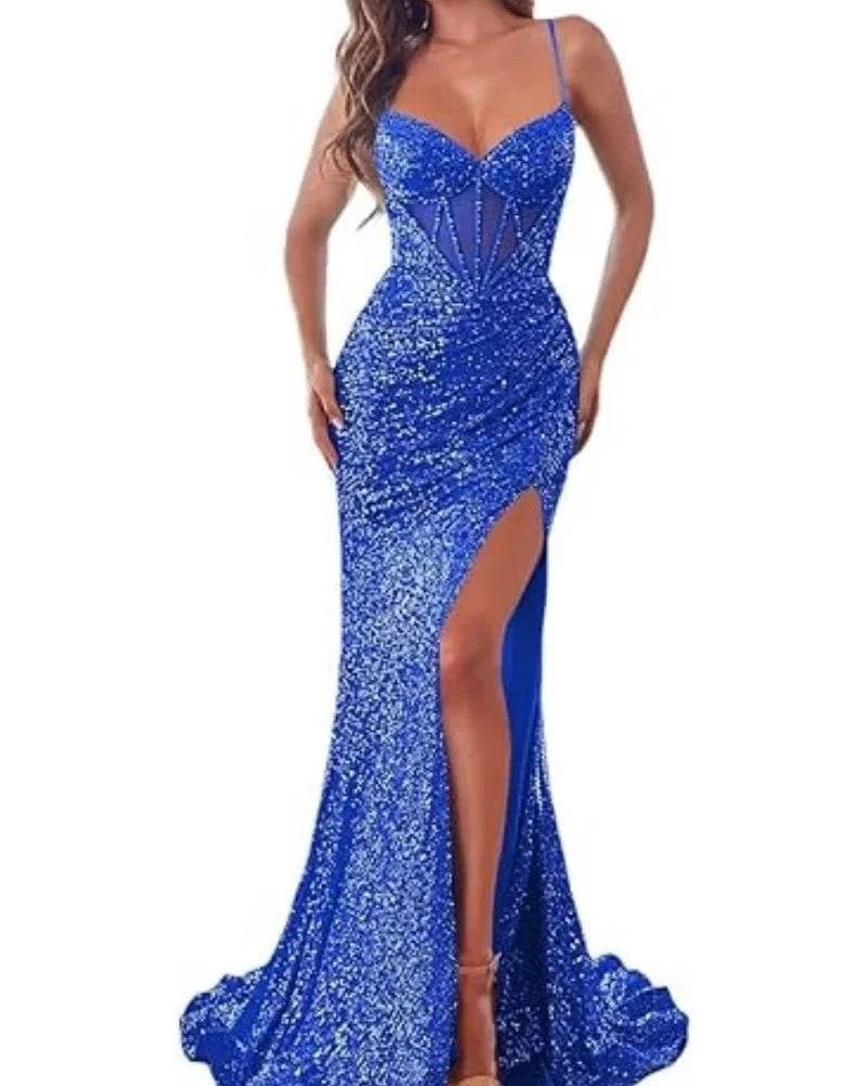 Royal blue sequin mermaid dress with spaghetti straps, sweetheart neckline, and side slit.