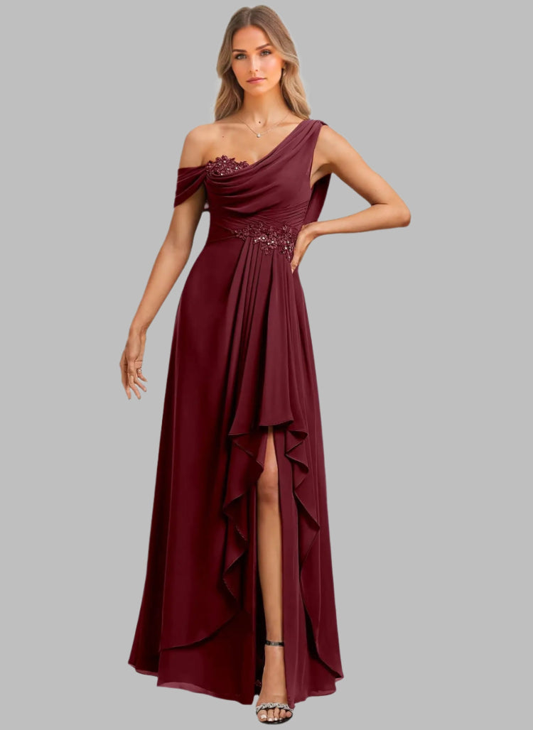 Burgundy evening gown with embellishments on a white background