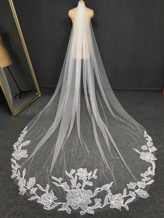 Single layer with appliqué floral lace wedding veil.  