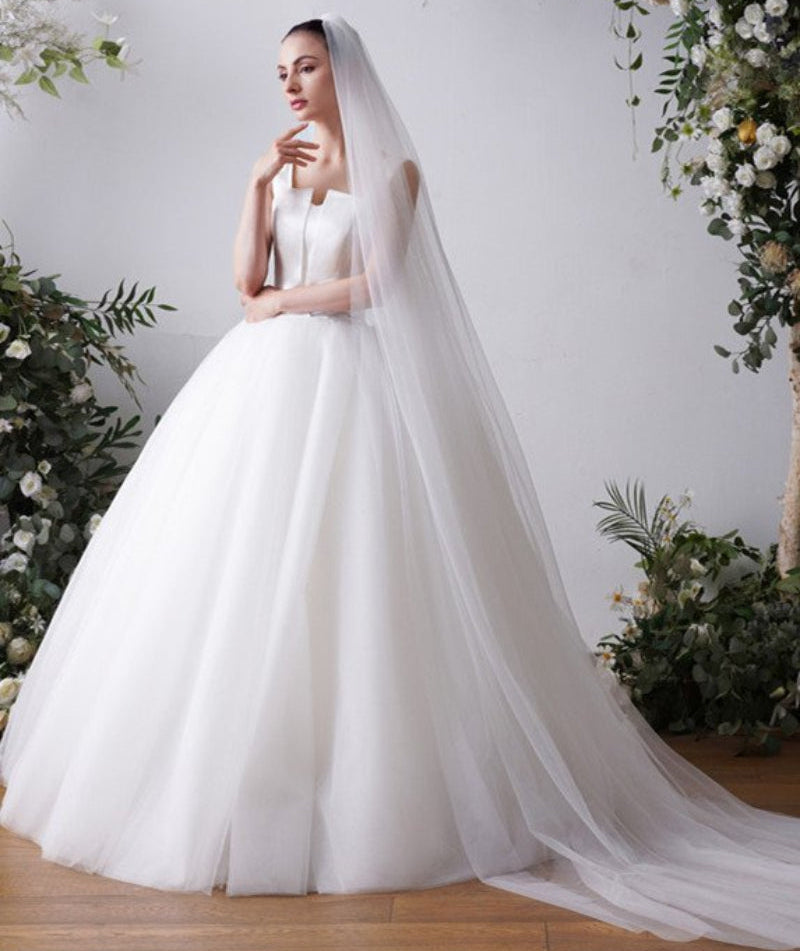 Cathedral bridal veil in white sheer tulle, plain cut edge, long flowing length