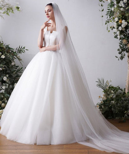 Cathedral bridal veil in white sheer tulle, plain cut edge, long flowing length