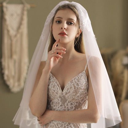 Ivory Elbow Length Veil With Blusher