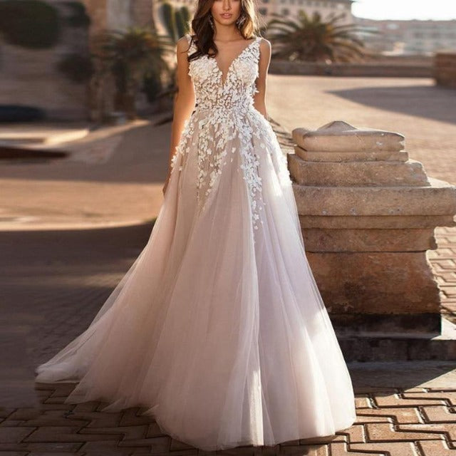 Ivory tulle wedding dress with V-neck, floral lace bodice, sleeveless A-line skirt
